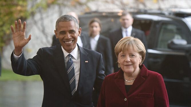 Obama junto a Merkel.