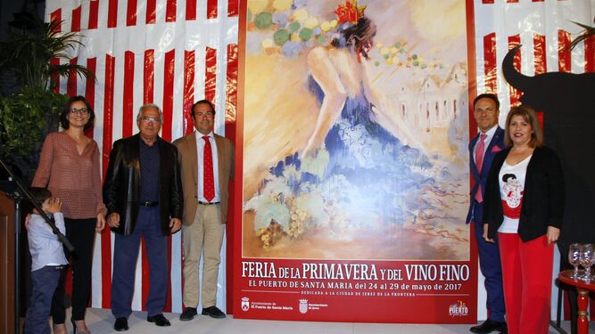 Una reproducción a gran escala del cartel de Feria, con la presencia del autor y su familia, los alcaldes de El Puerto y Jerez e Iván Llanza.