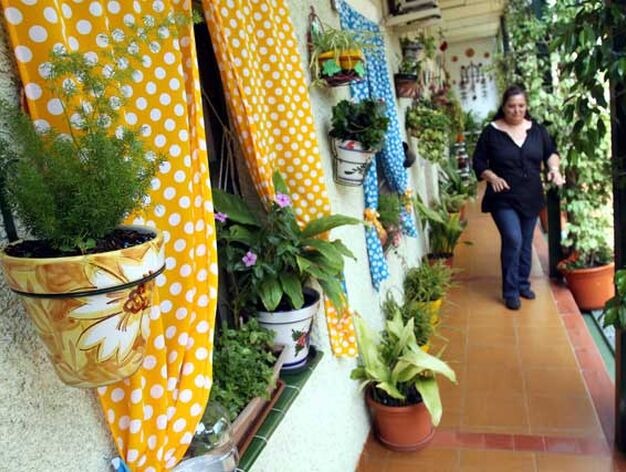 El Perchel y La Trinidad engalanan los patios de sus corralones

Foto: Migue Fernandez