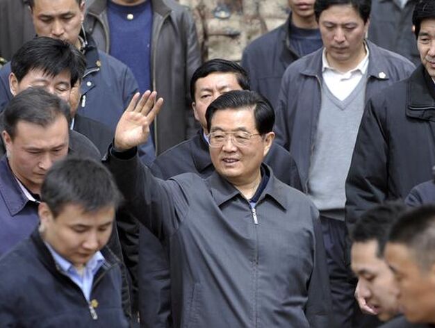 Hu Jintao saluda a los aficionados.

Foto: EFE/ AFP/ Reuters