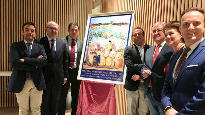 Una imagen de la presentación en Osborne del cartel de feria de la caseta El Revuelo, obra del pintor Adrián Ferreras.