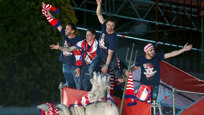 Los jugadores del Atlético celebran su triunfo.