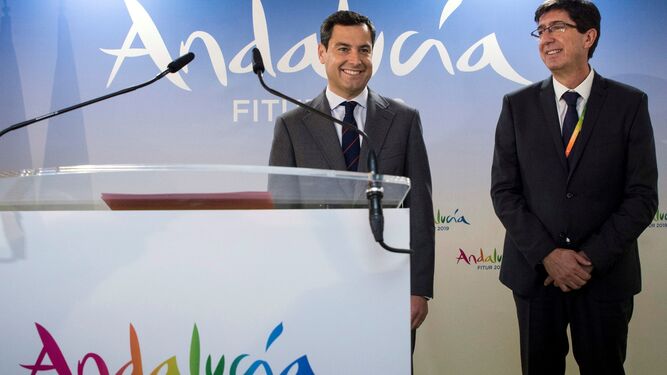 El presidente de la Junta de Andalucía, Juanma Moreno, y el vicepresidente Juan Marín, en Fitur 2019