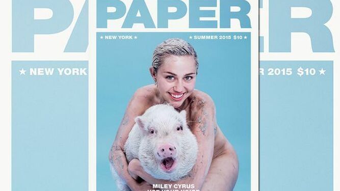 Miley Cyrus en la portada de 'Paper' con su cerda