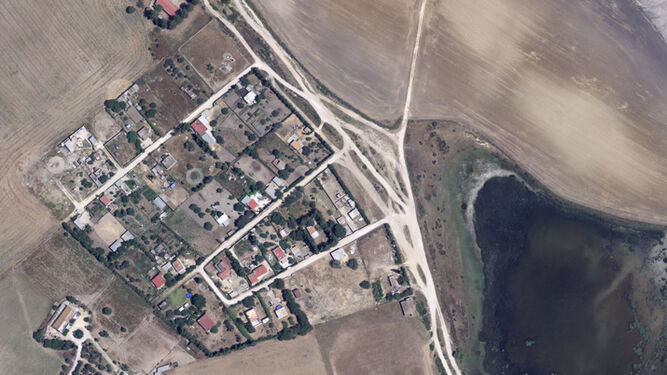 Una imagen aérea de la urbanización El Barranco, junto a las lagunas portuenses.