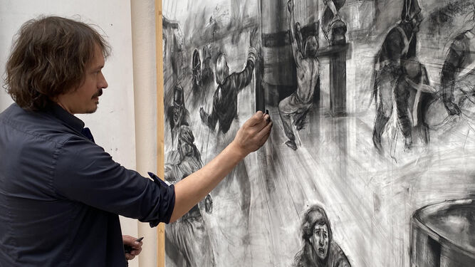 El artista Daniel Parra trabajando en una de las obras de 'Trafalgar: el viaje con Galdós'.