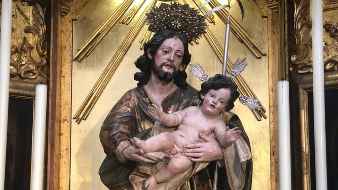 La imagen de San José con el Niño en brazos.