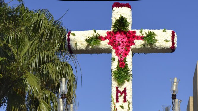 Parte del cartel del X aniversario de la Cruz de Mayo de Puntales.